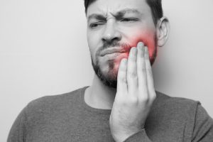 throbbing pain after tooth extraction but not dry socket